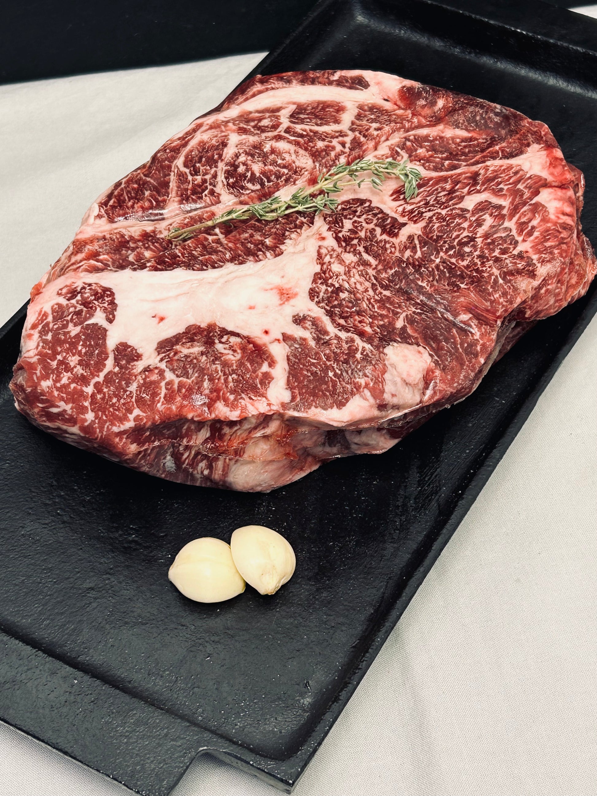 Close-up of seasoned beef chunks highlighting marbling and rich texture, ready for cooking or grilling
